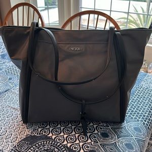 Great travel bag by Tumi in excellent condition.